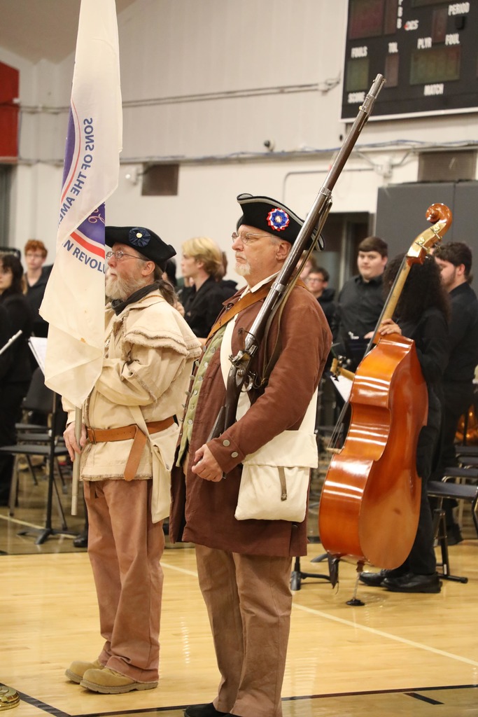 Sons of American Revolution presenting the colors at the Veterans Day Assembly