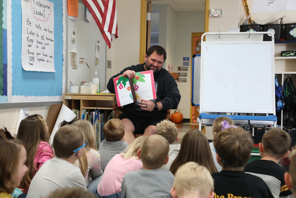 Mr Breyer reading to the students