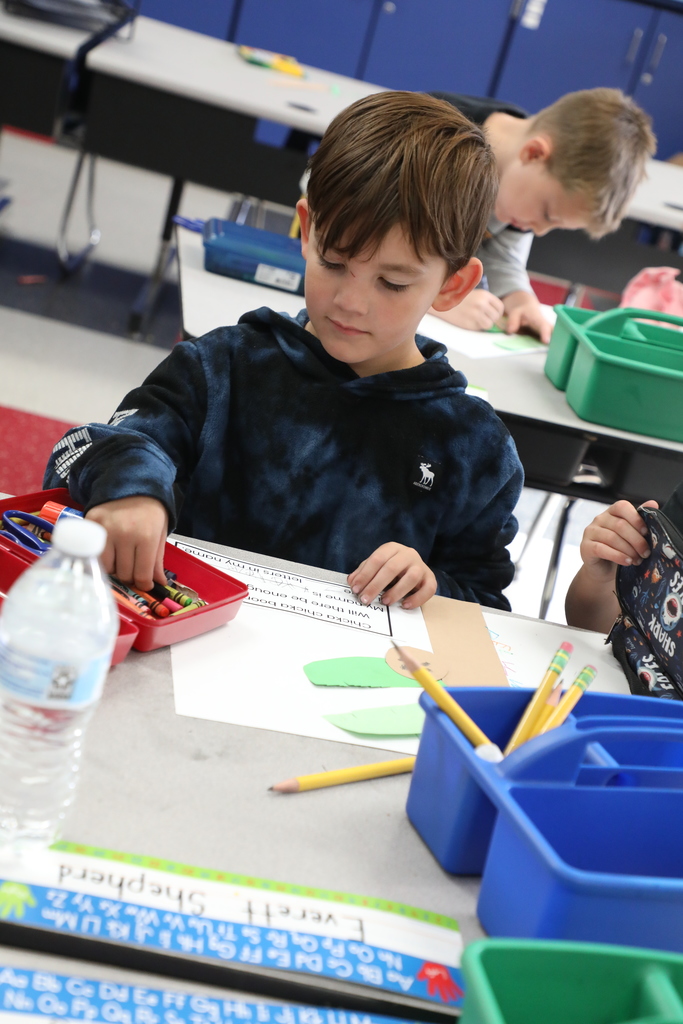 Students working on craft project