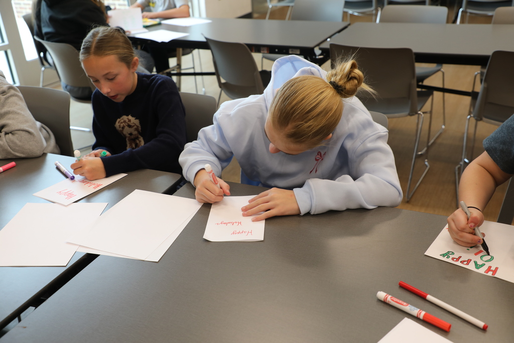 Student working on a holiday card