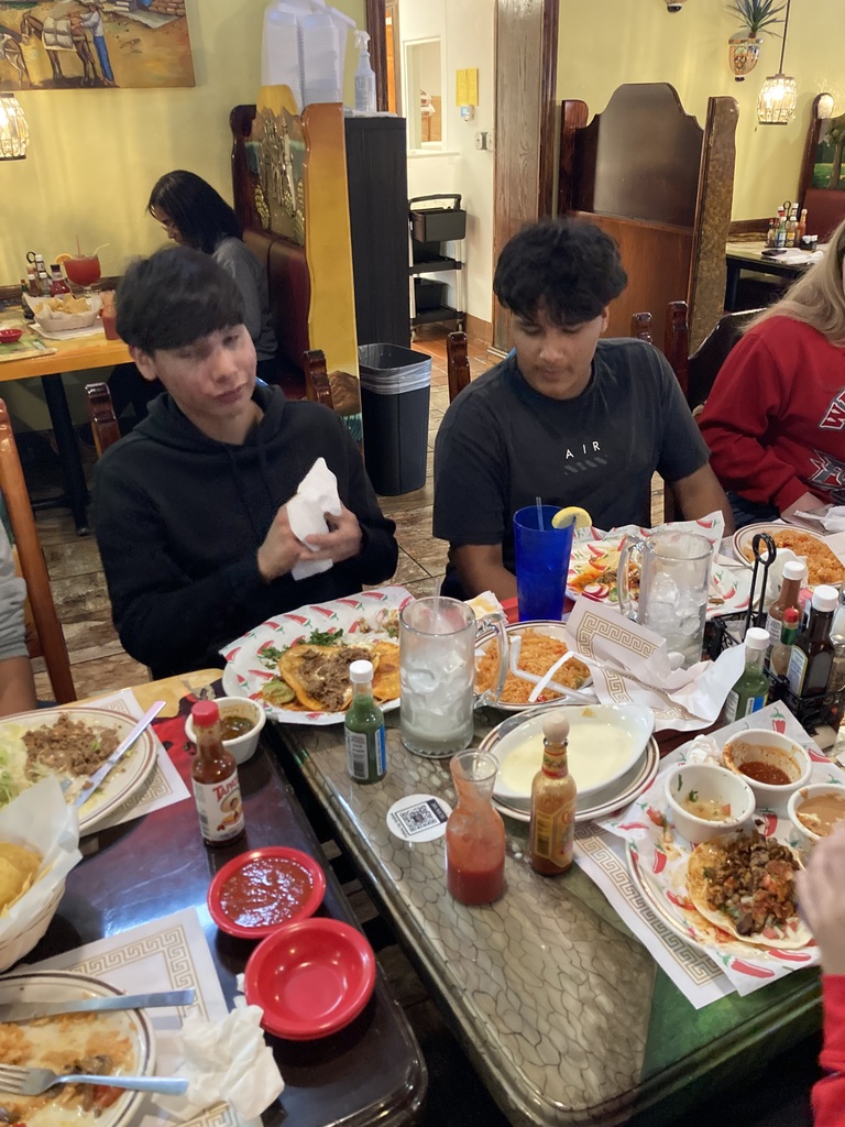 Students eating at Los Mariachis Restaurant