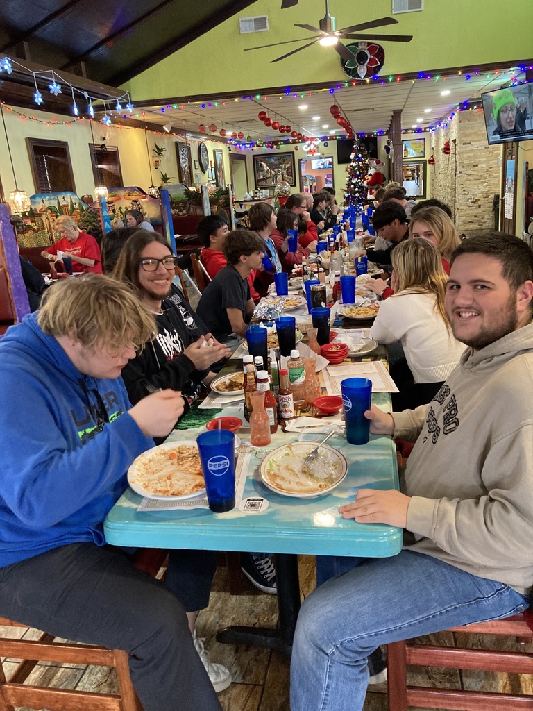 Students eating at Los Mariachis Restaurant