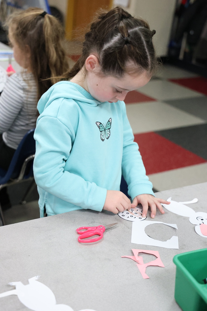 Student coloring a picture of a cookie