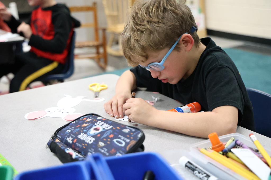 Student coloring a picture of a cookie