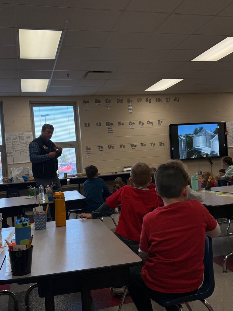 Mr. Ruff talking with the students