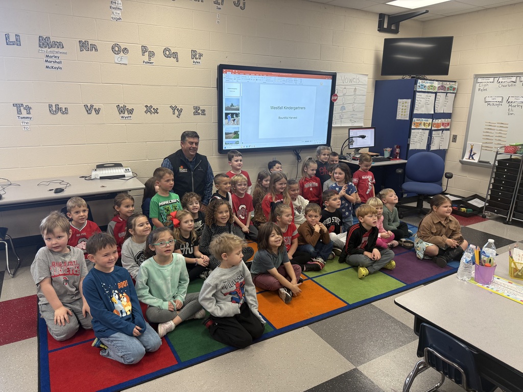 Mr. Ruff posing with the students