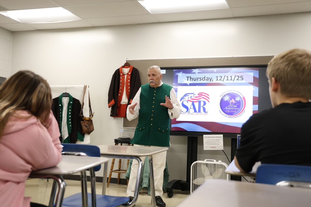 Kevin Driesbach speaking to students