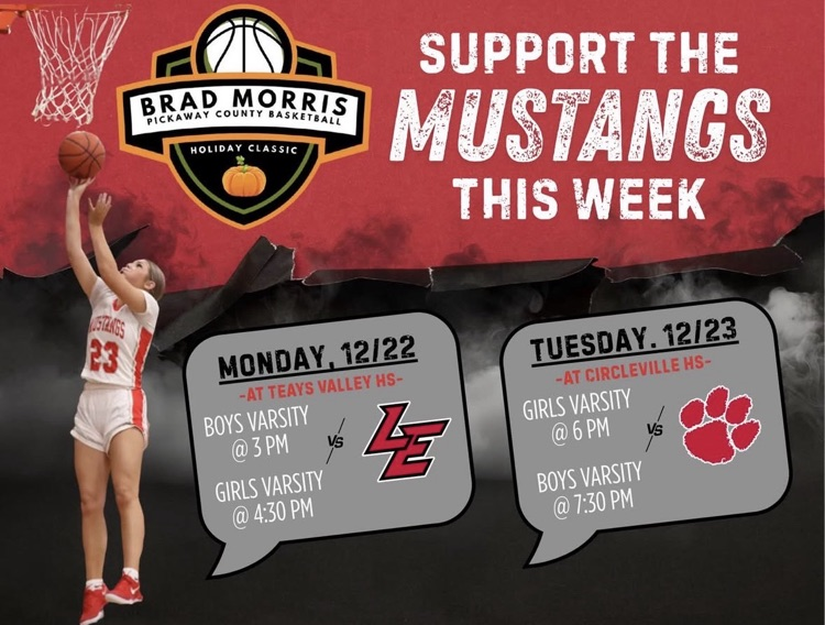 basketball player jumping to make shot 