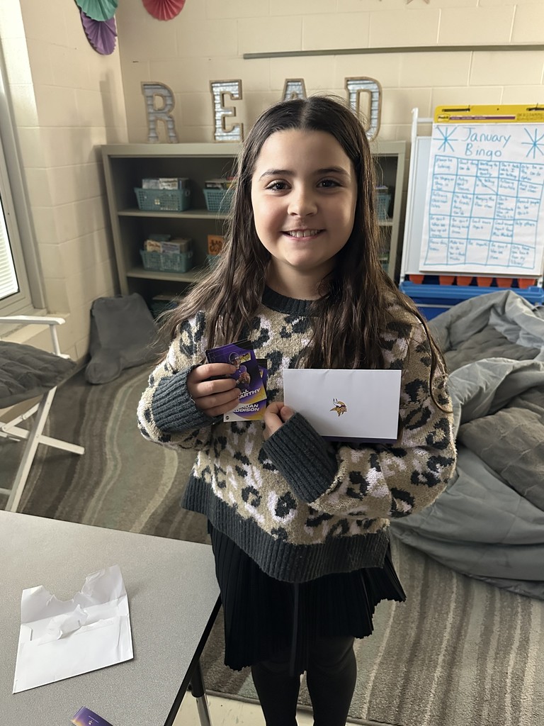 Student holding Letter from Minnesota Vikings