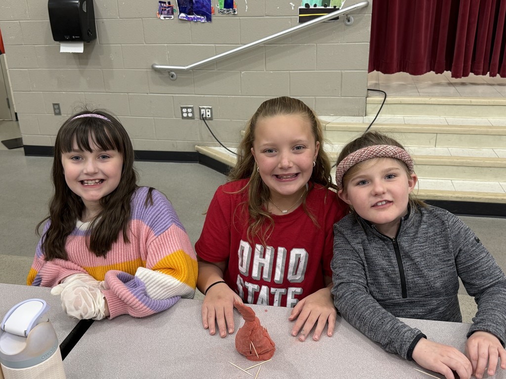 Students working together on playdough creations