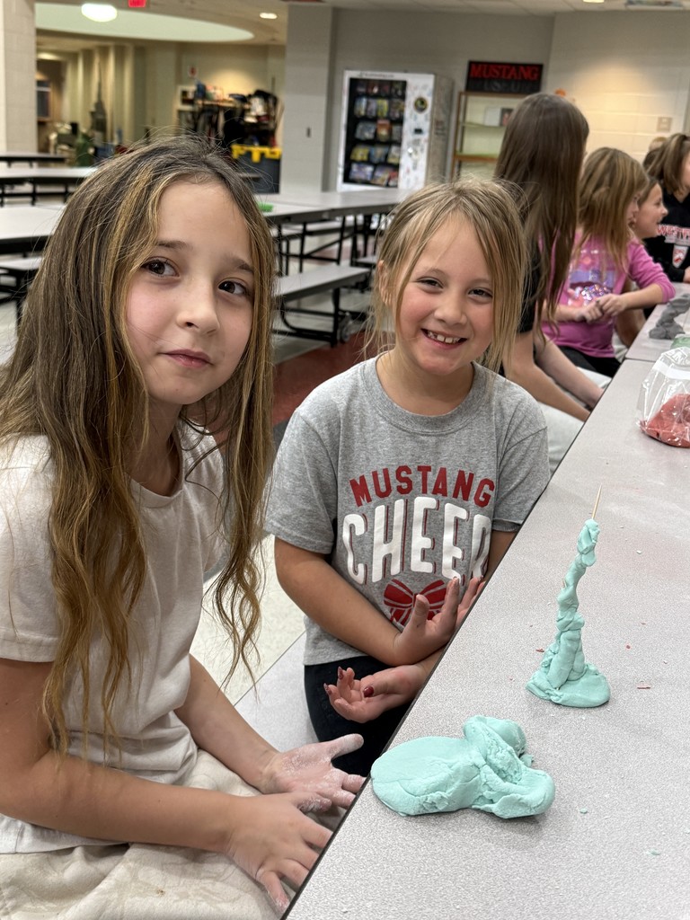 Students working together on playdough creations