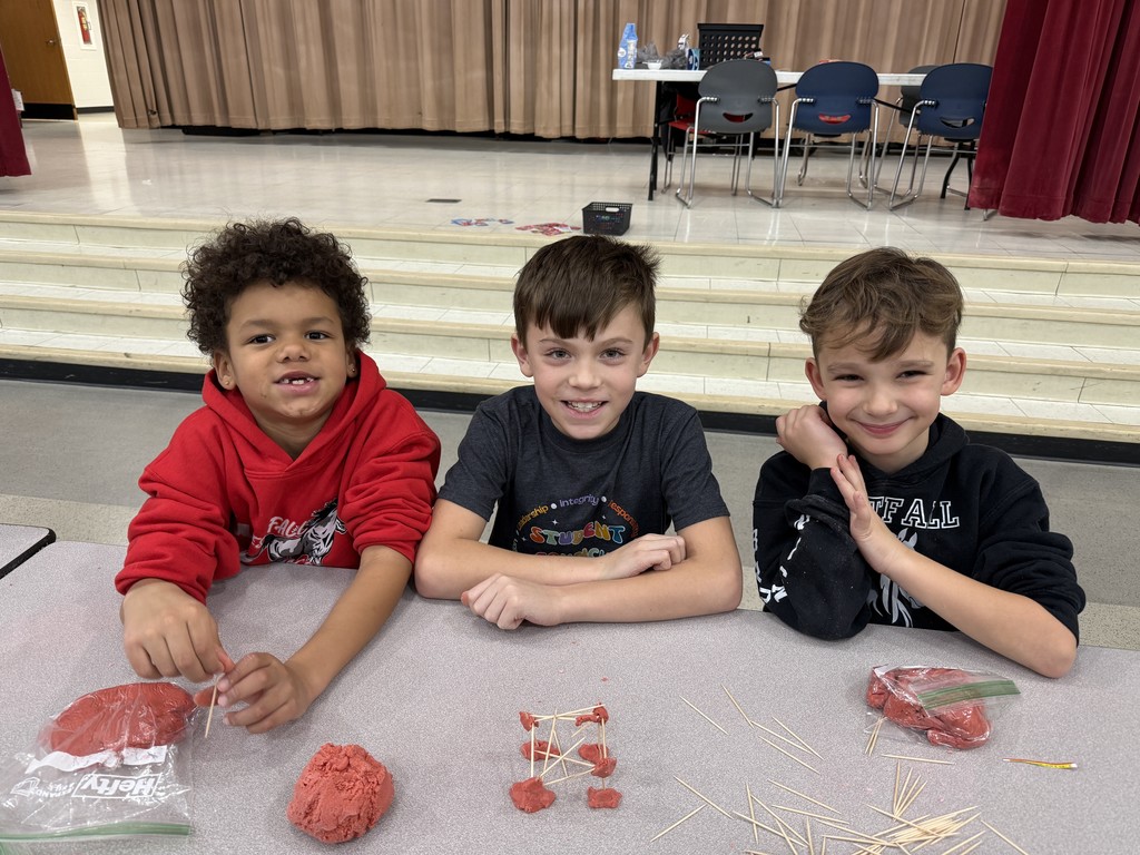 Students working together on playdough creations
