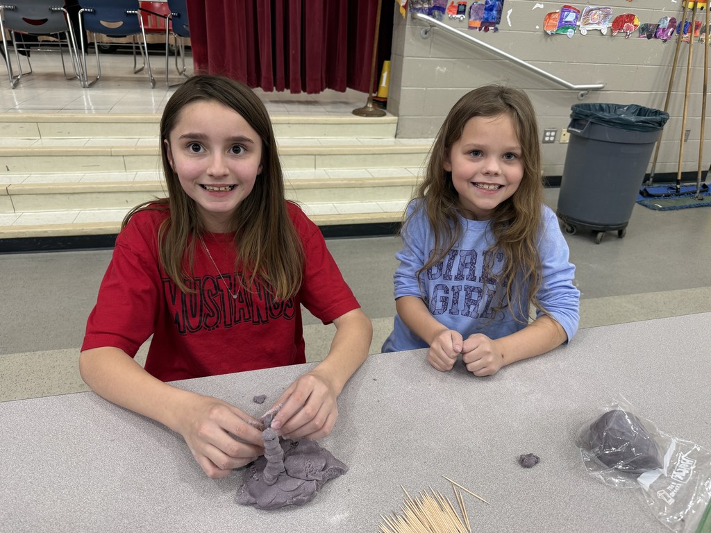 Students working together on playdough creations