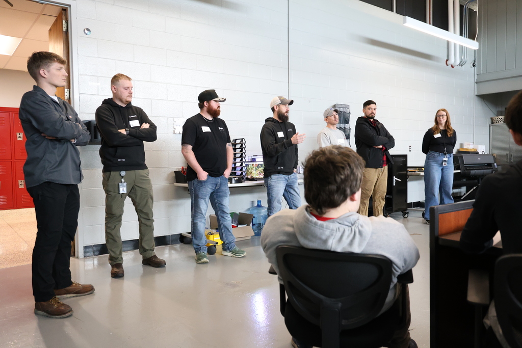 Speakers from Anduril talking to students