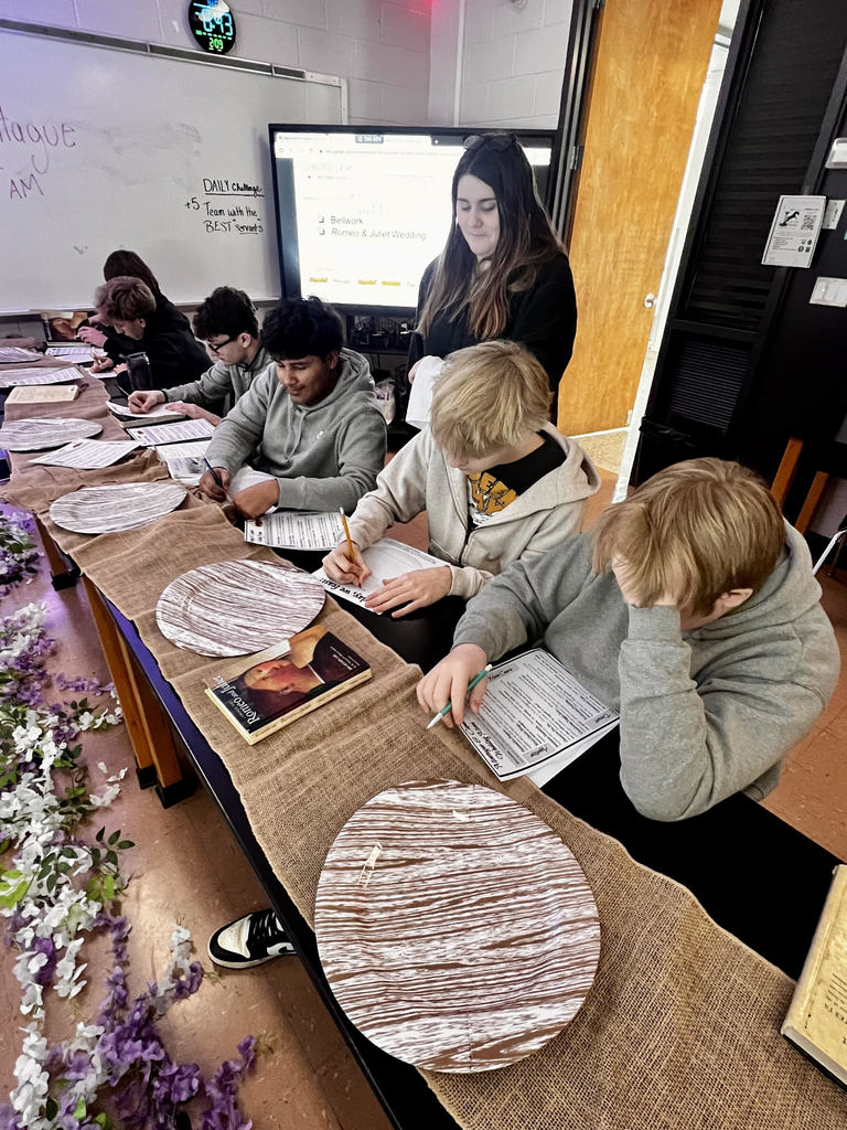 Students performing Romeo & Juliet wedding dinner scene