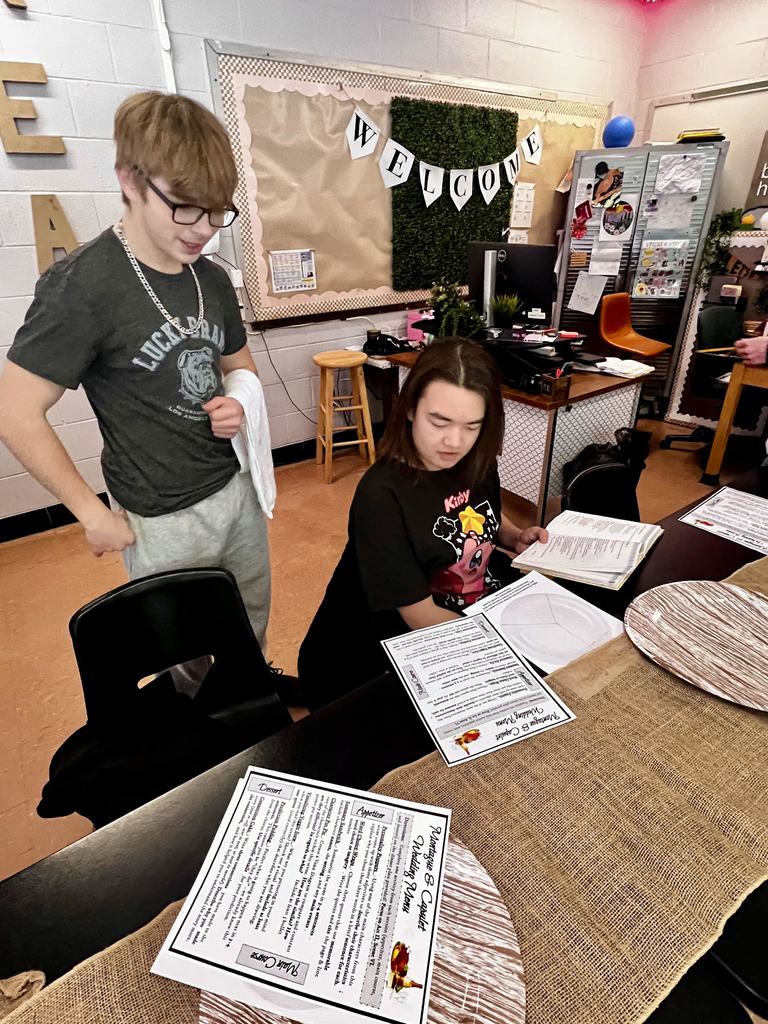 Students performing Romeo & Juliet wedding dinner scene