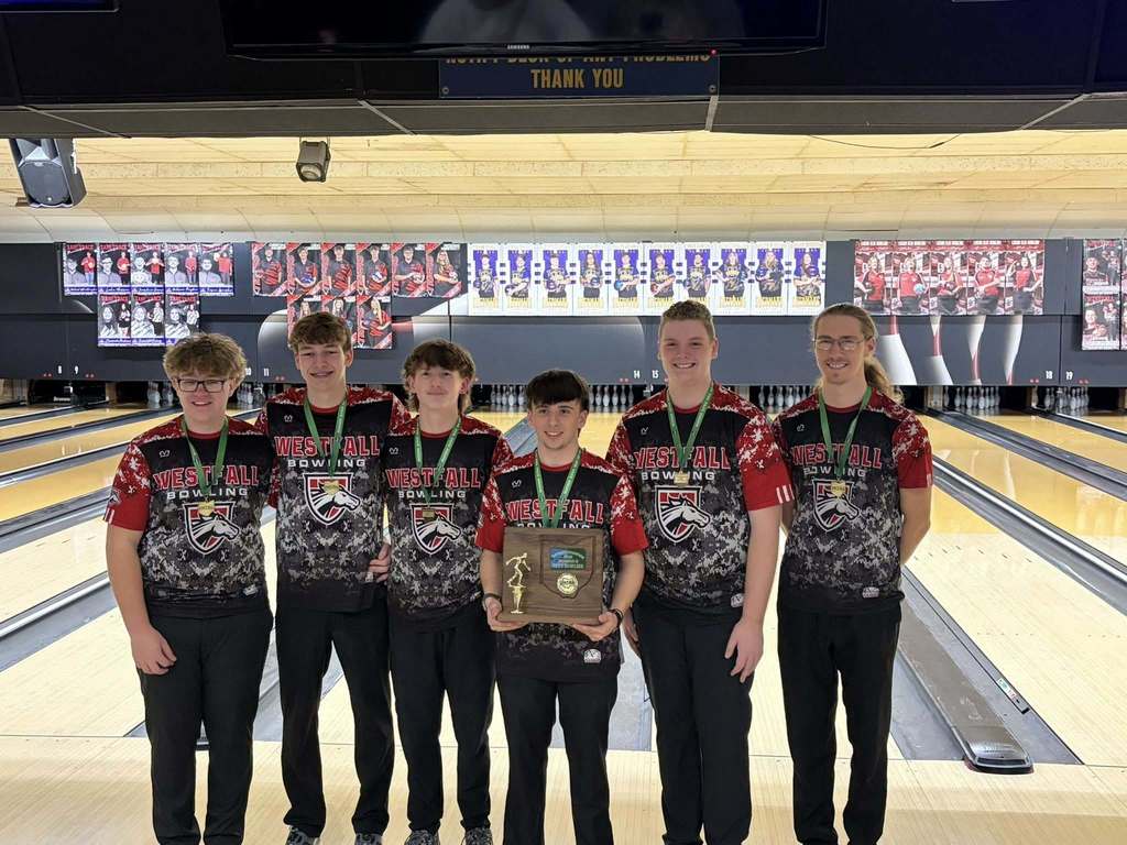 Boys Bowling Team with winning plaque