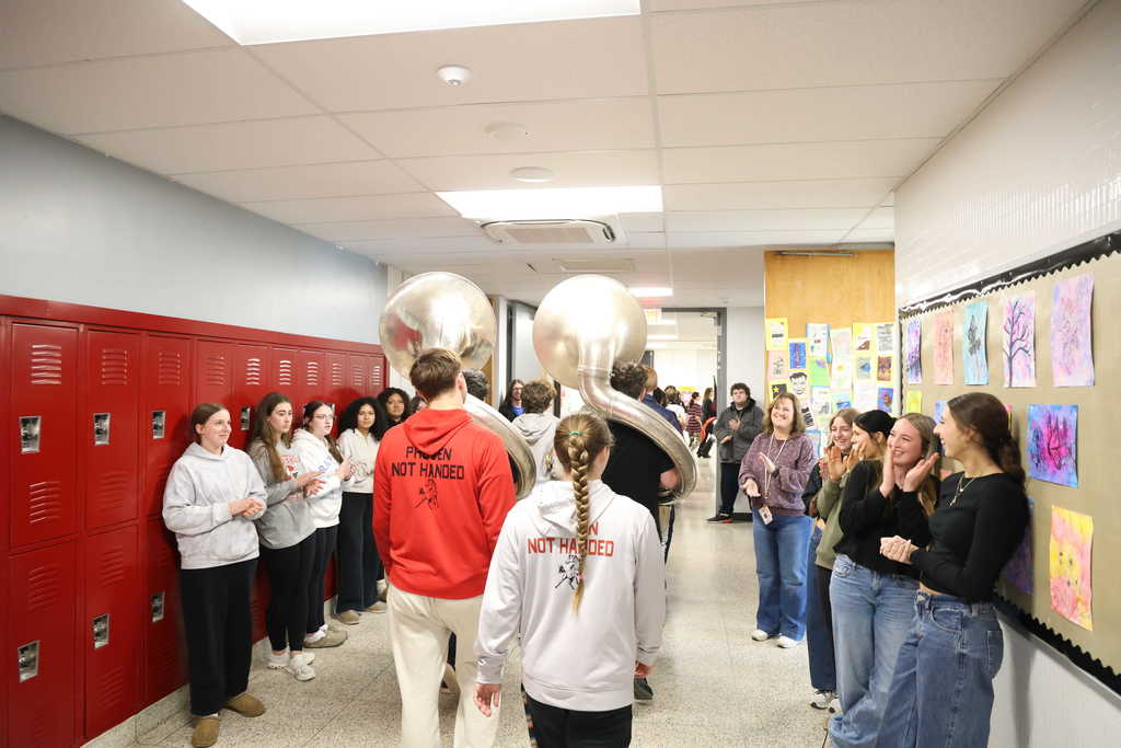Students cheering in the hallway
