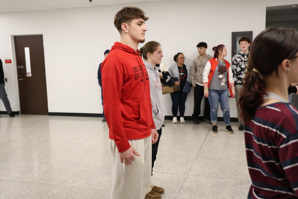 Students watching band play