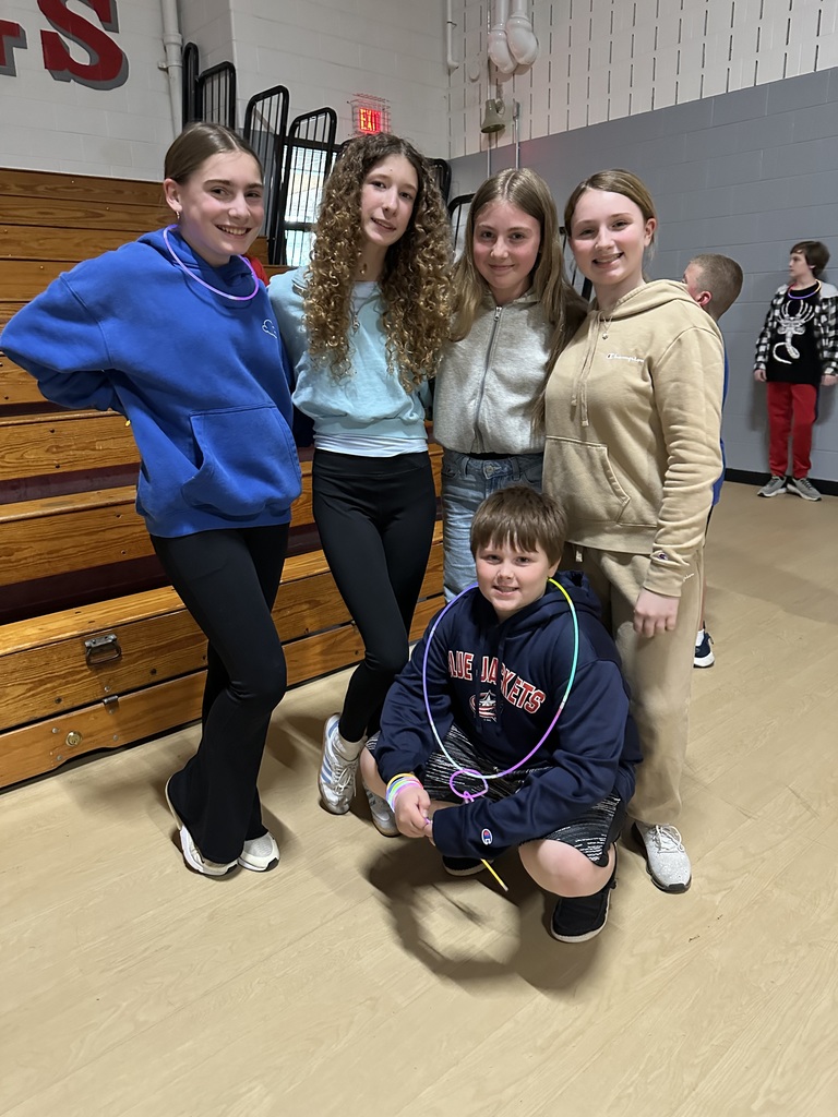 Students posing during glow party