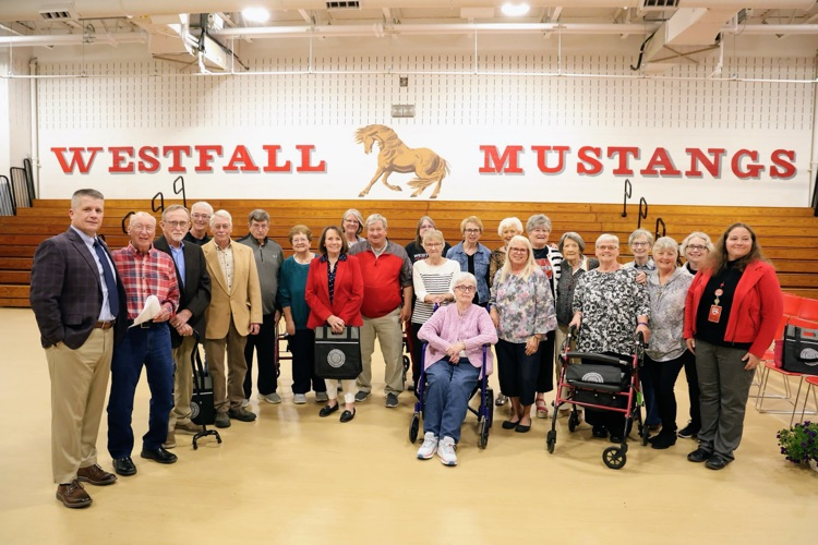 group photo of former staff members