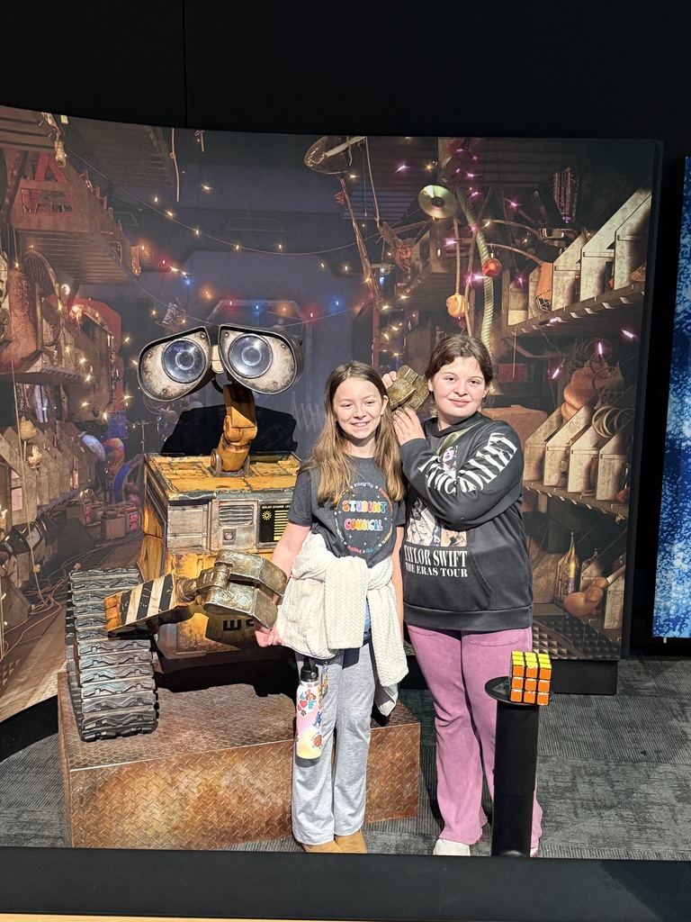 Students enjoying COSI exhibits