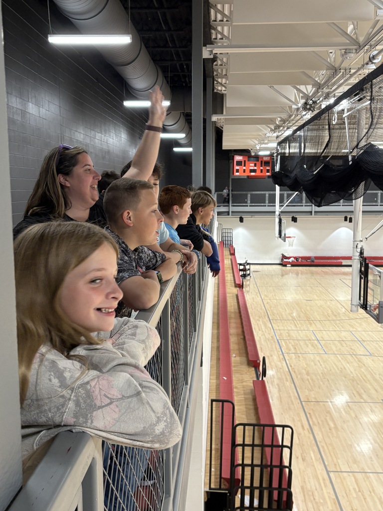 Students looking over the railing in the MAC