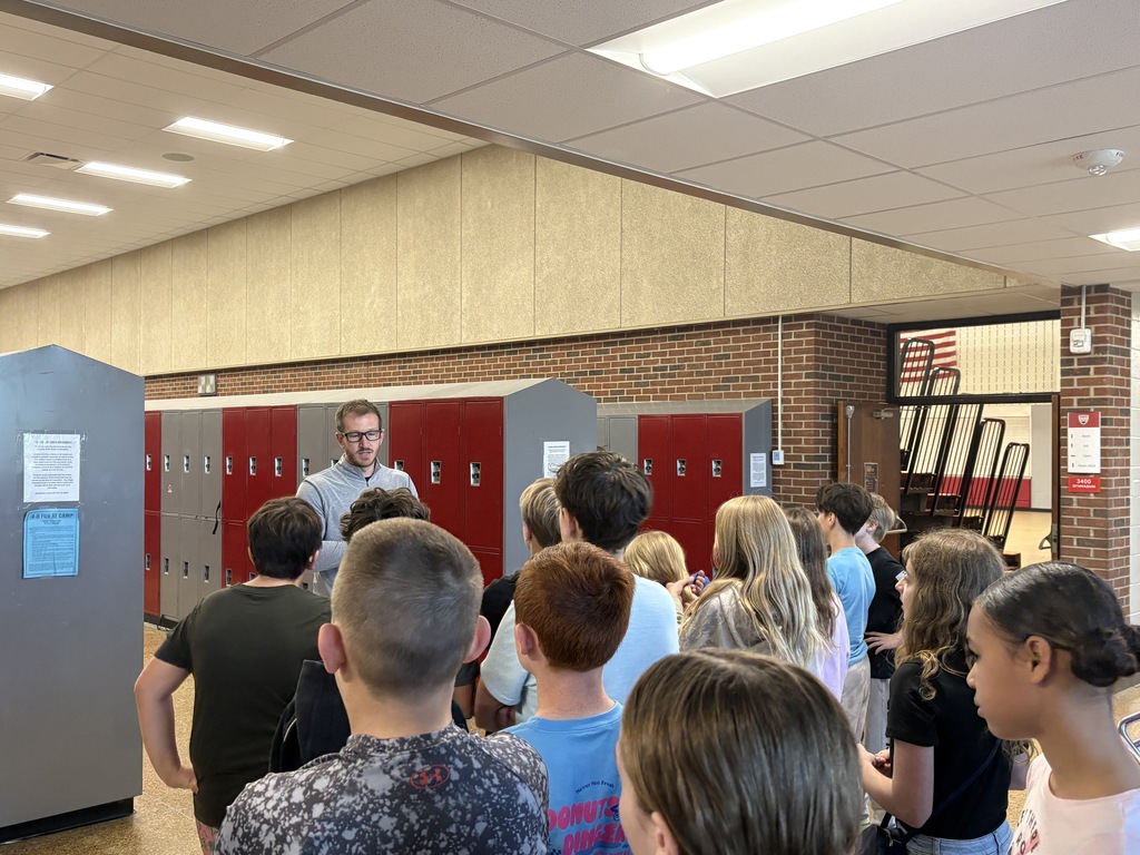Mr. Pavey explaining lockers to students
