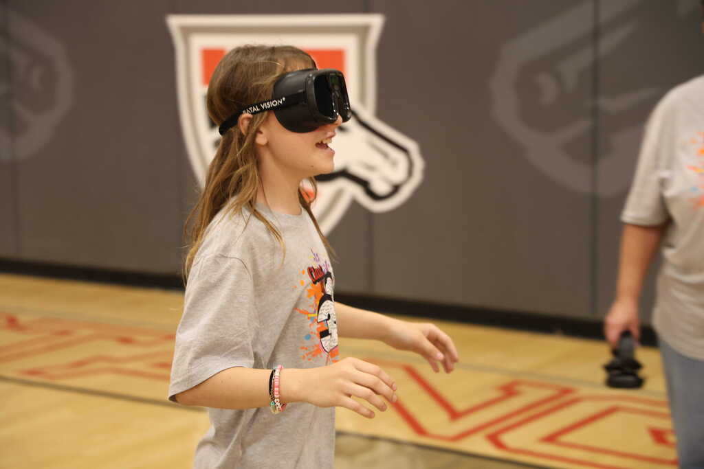 Student wearing impairment googles