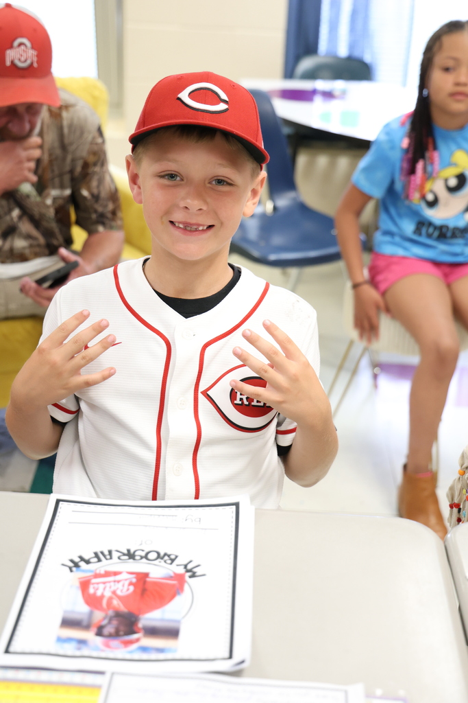 Student dressed in a Cincinnati Reds uniform