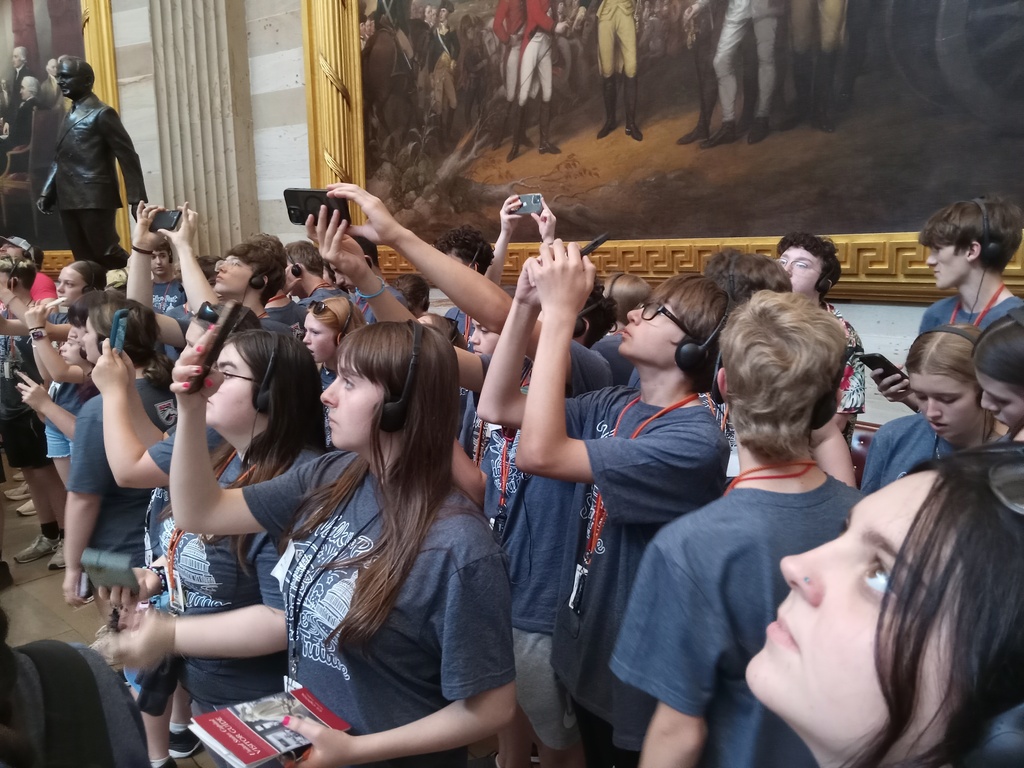Students taking photos with their phones