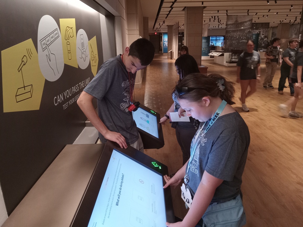 Students looking at display screen