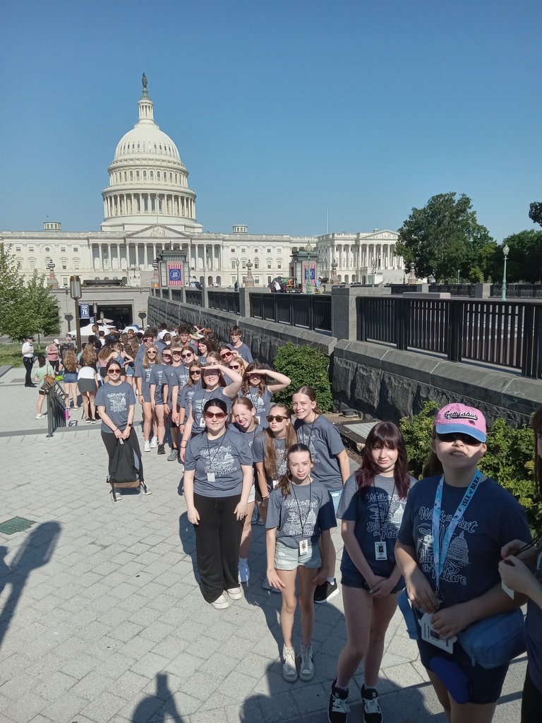 Students standing in front of Capitol Building