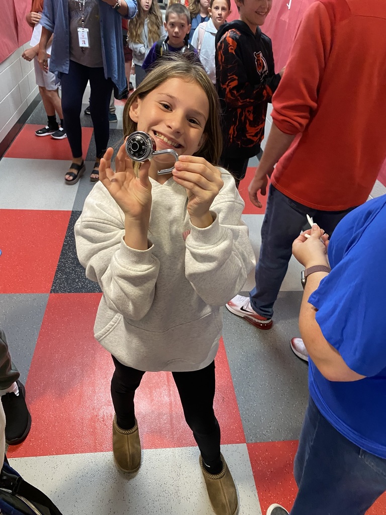 Student celebrating that she got her combo lock open