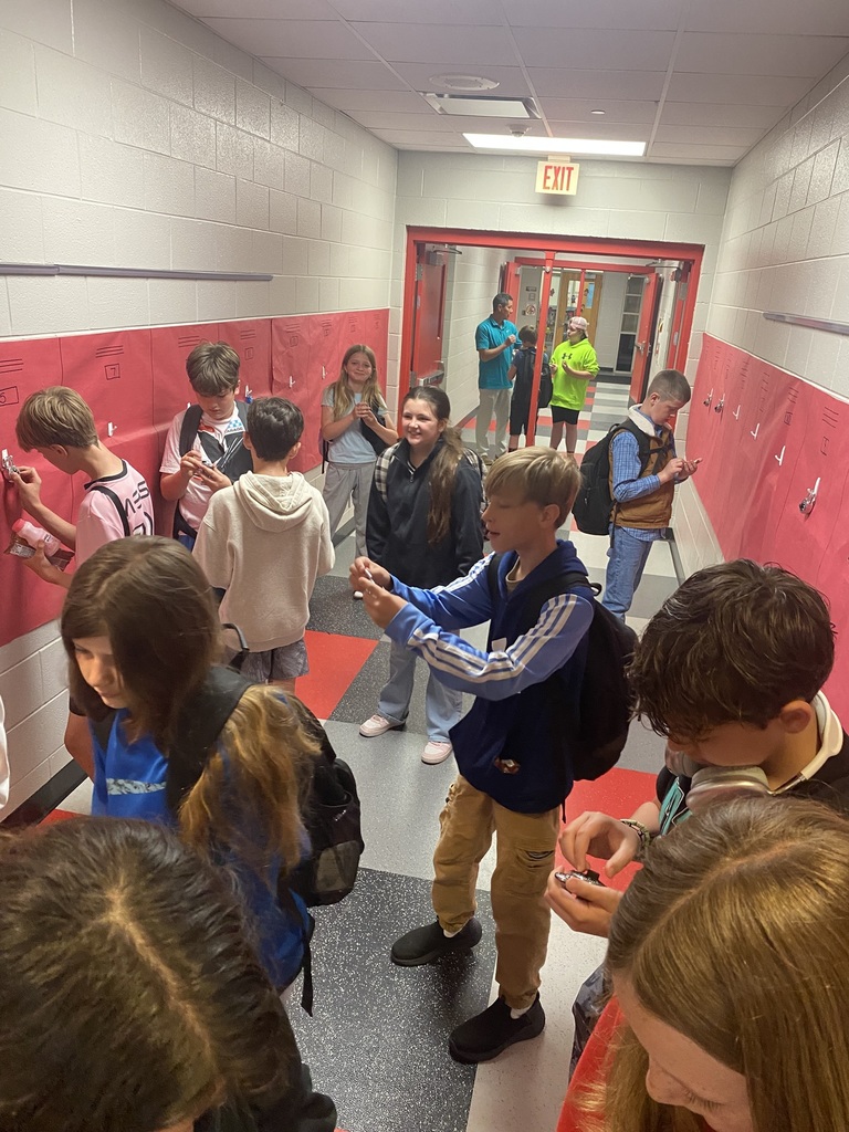 Students working on their combo locks