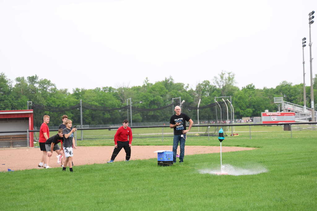 students launching bottle rockets