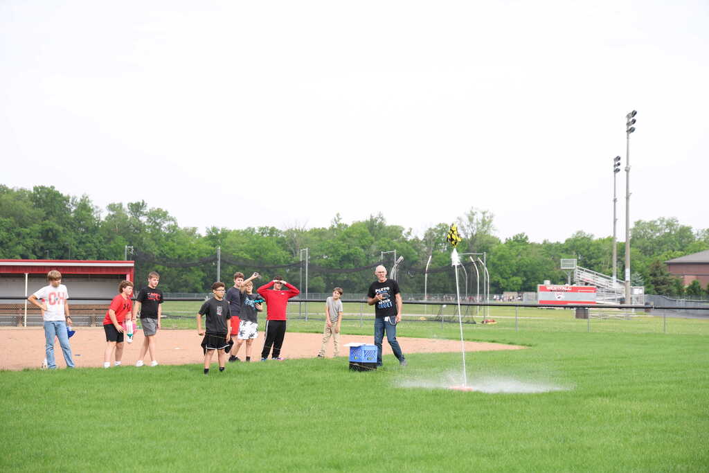 students launching bottle rockets