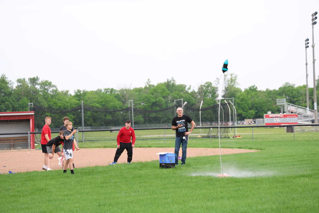 students launching bottle rockets