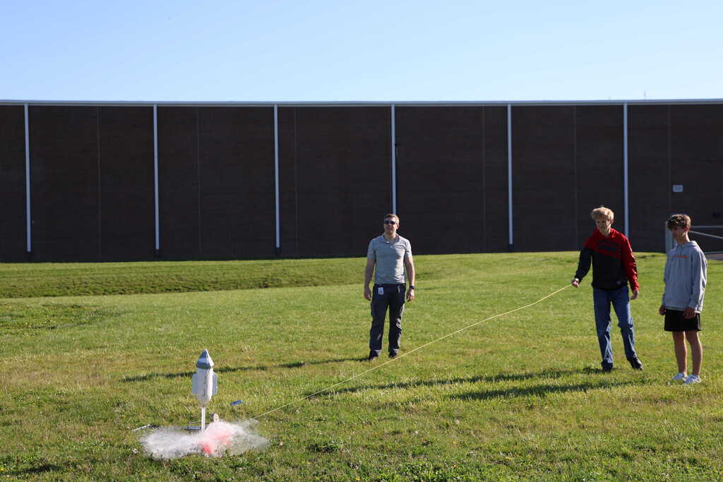 students launching bottle rockets