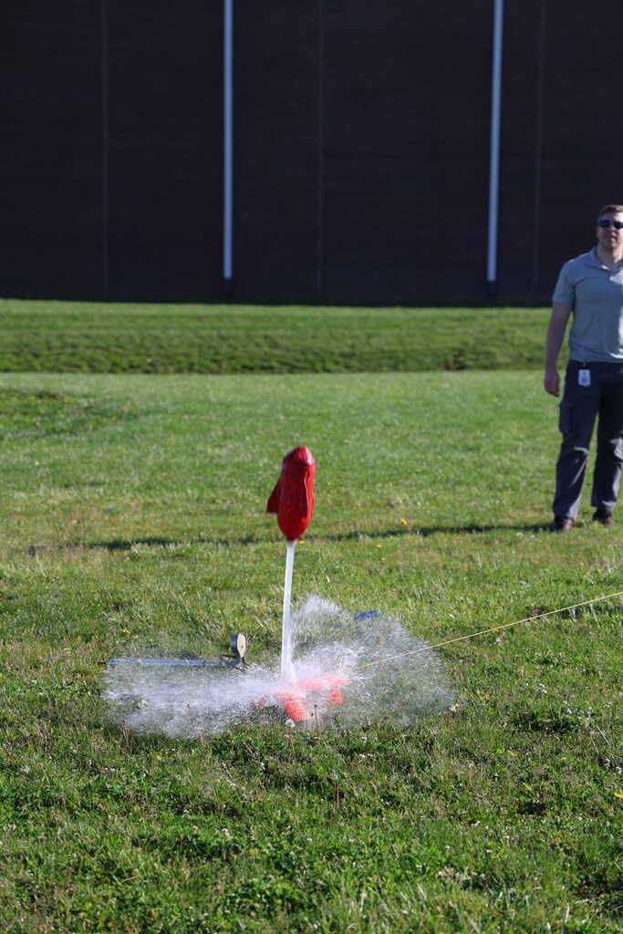 students launching bottle rockets
