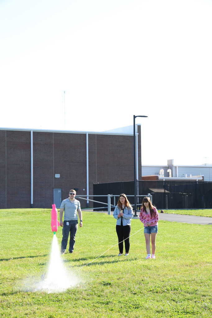 students launching bottle rockets