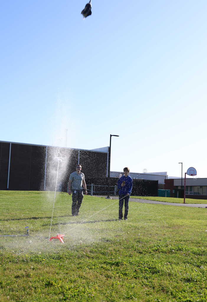 students launching bottle rockets
