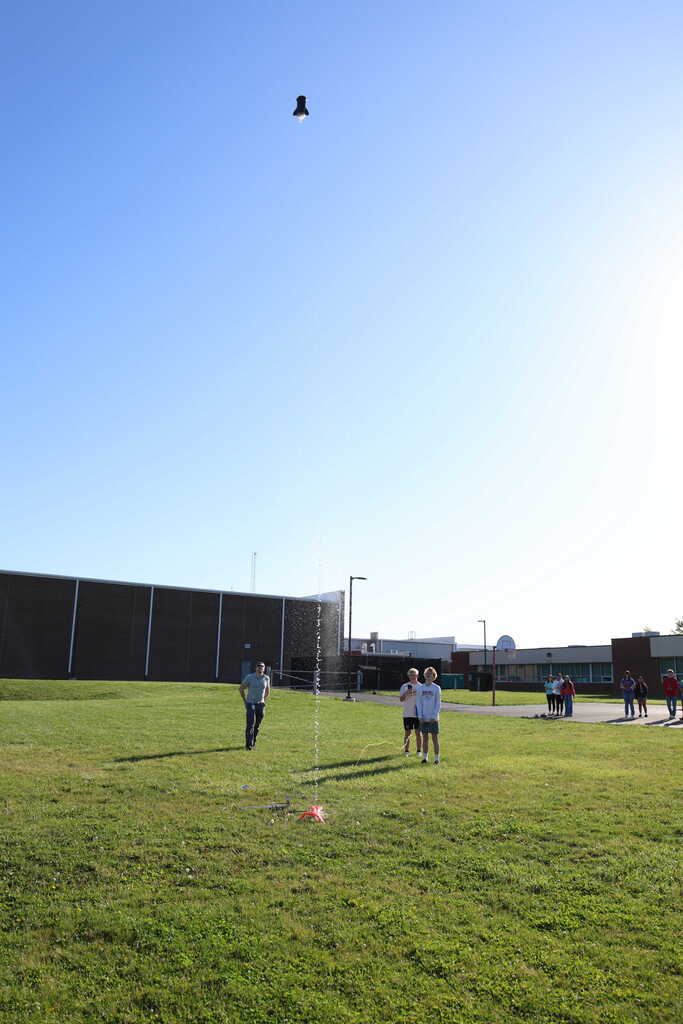 students launching bottle rockets