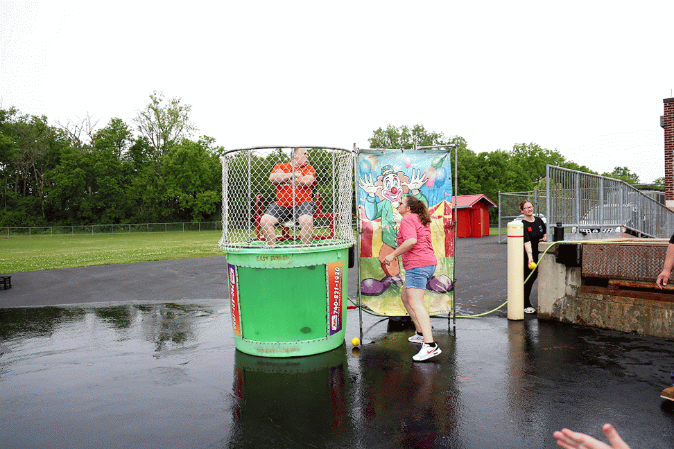 Mr. Waters being dunked in the dunk tank