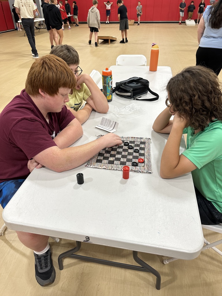 Kids playing checkers
