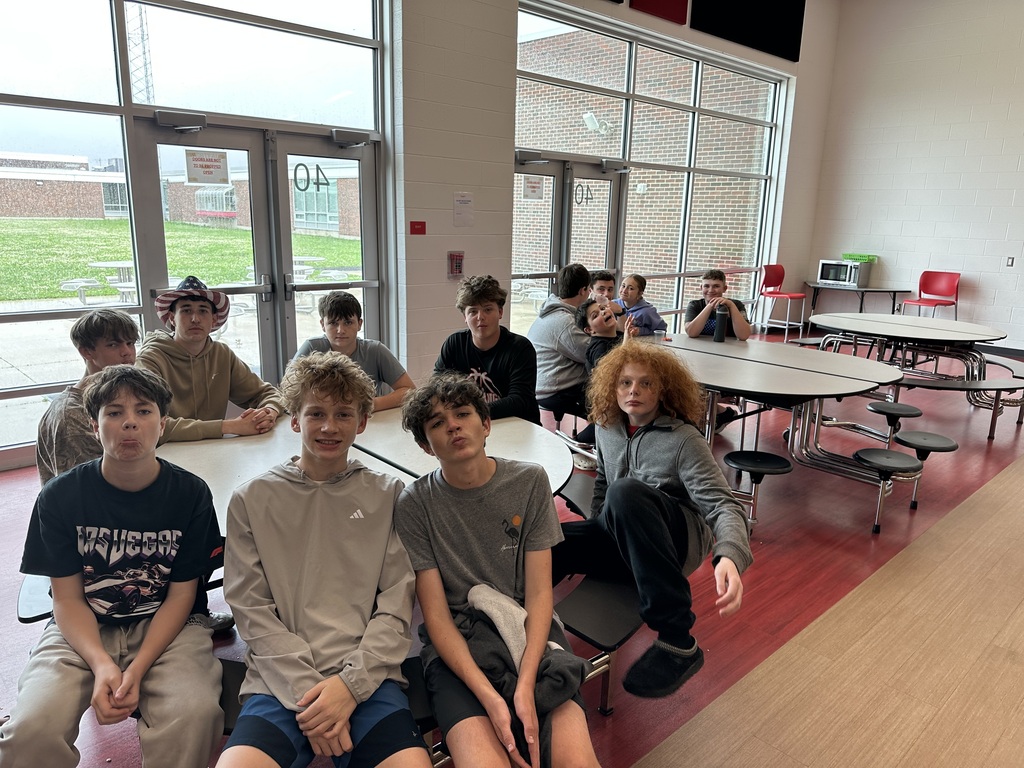 Students sitting at a lunchroom table