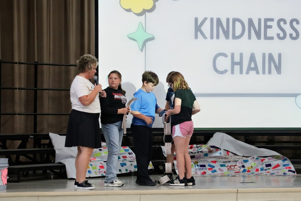 Students working on paper chain