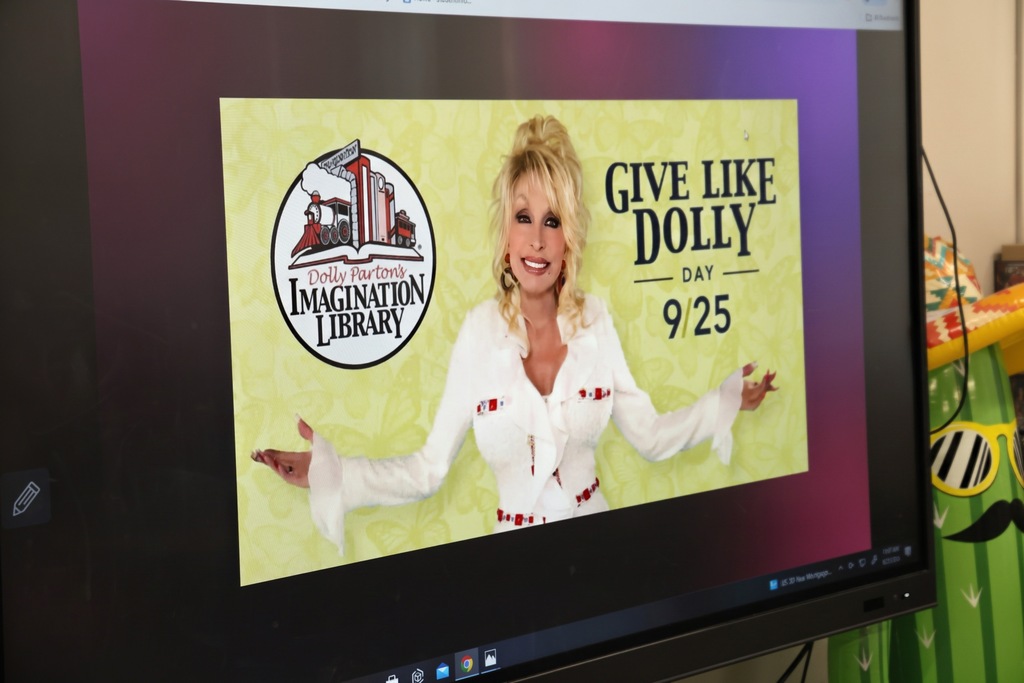 Give Like Dolly Day on TV screen