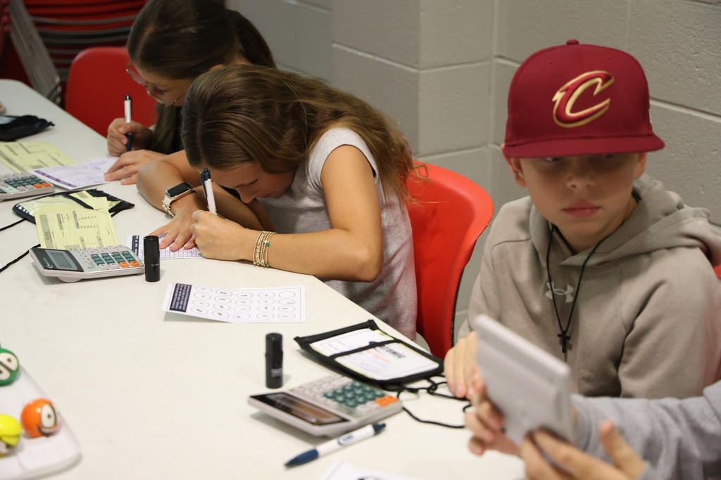 Student conducting bank business at the Student Run Credit Union
