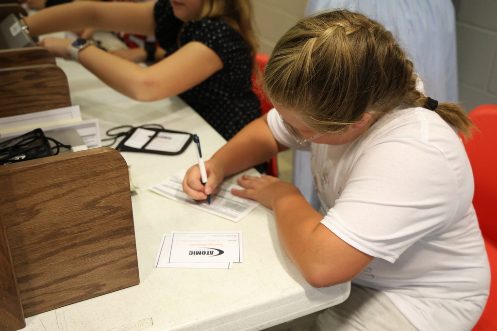 Student conducting bank business at the Student Run Credit Union